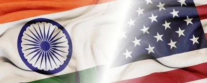 India and United States flags handshake symbolizing growing bilateral cooperation