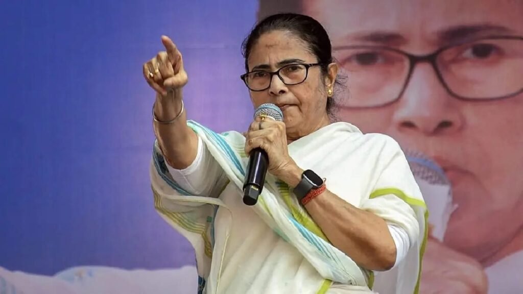 “strong female political leader resembling Mamata Banerjee speaking passionately, pointing forward, crowd behind, intense expression, Indian political rally atmosphere, no media mic, cinematic lighting”