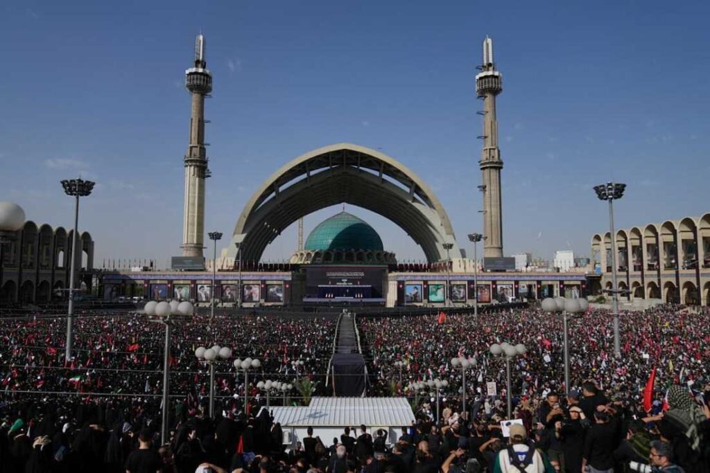 Crowds gather in Tehran during Ayatollah Ali Khamenei's funeral procession.